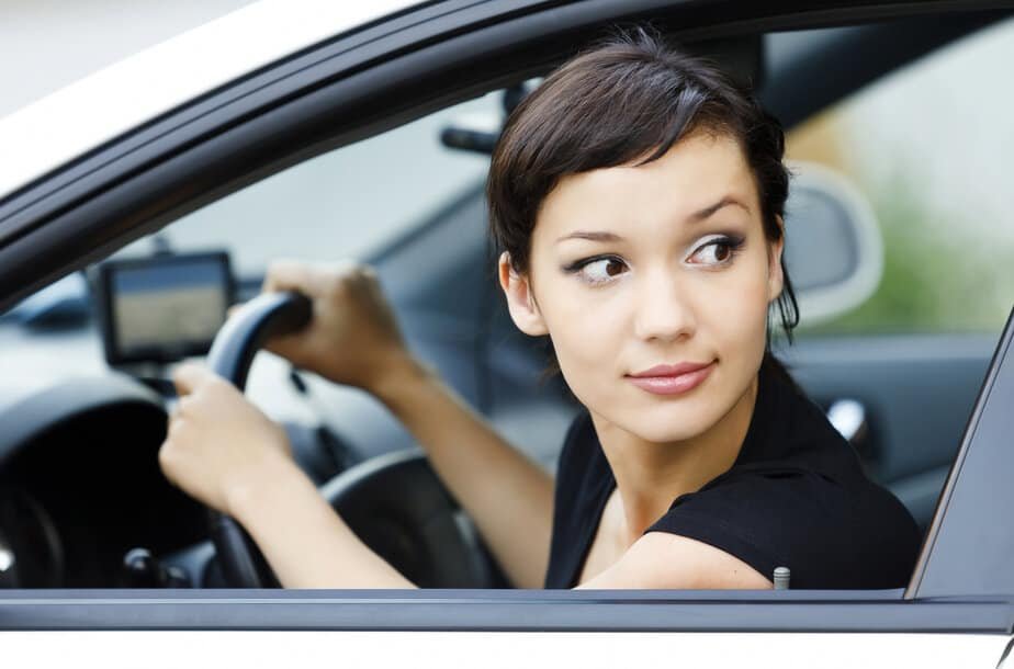 Woman parking car Woman parking car