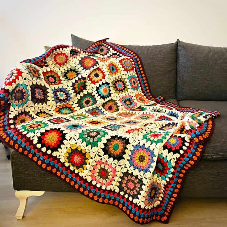 an image of afghan blanket on a couch