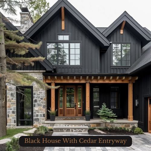 an image of a black house with cedar entryway