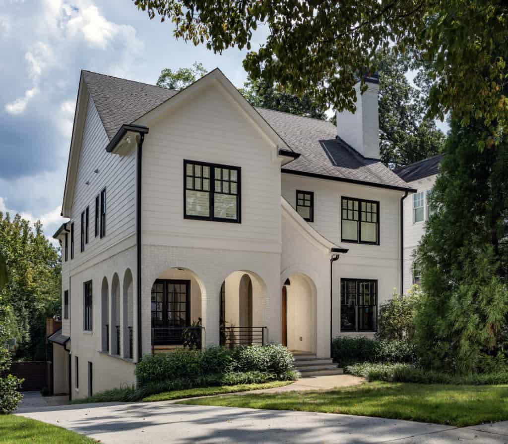 cream white house with black trim