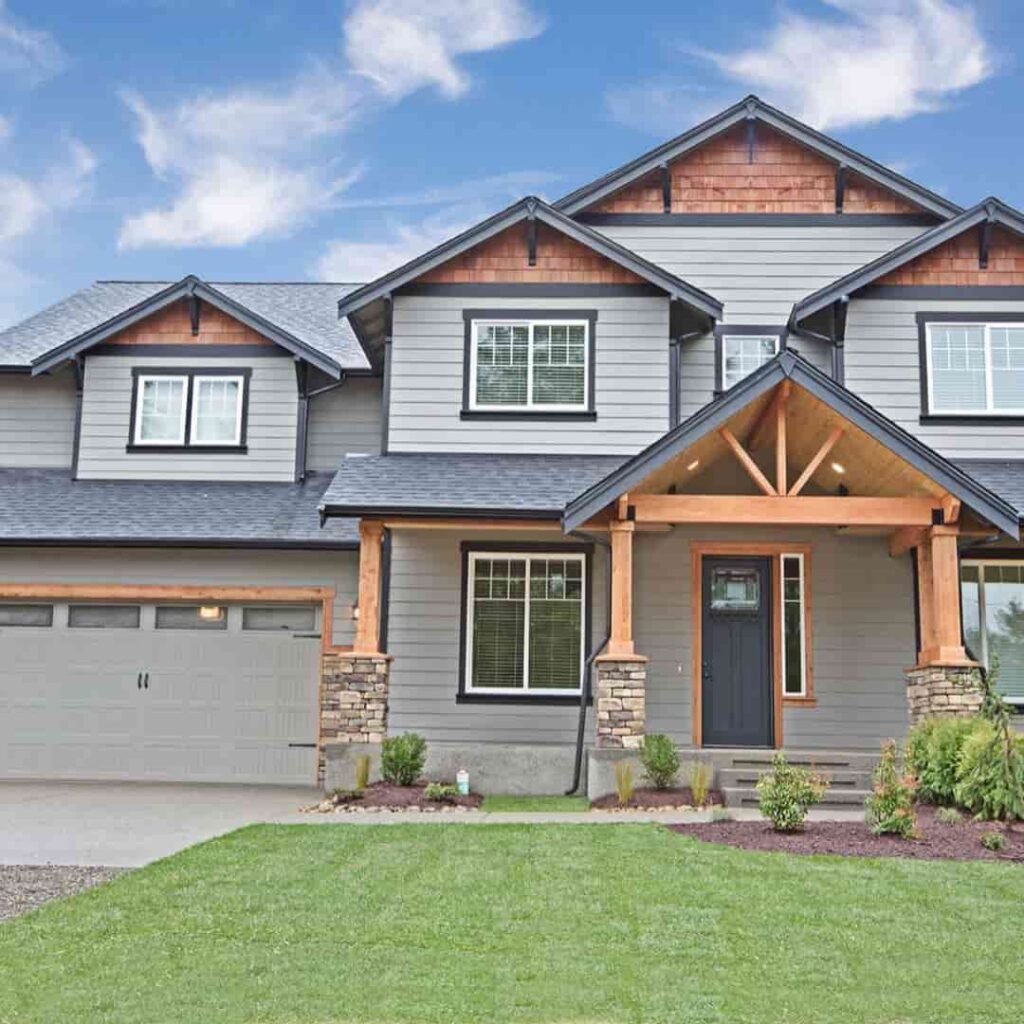 rustic gray house with black trim and cedar trim