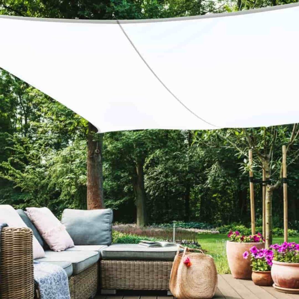 an image of white colored sail extension patio roof