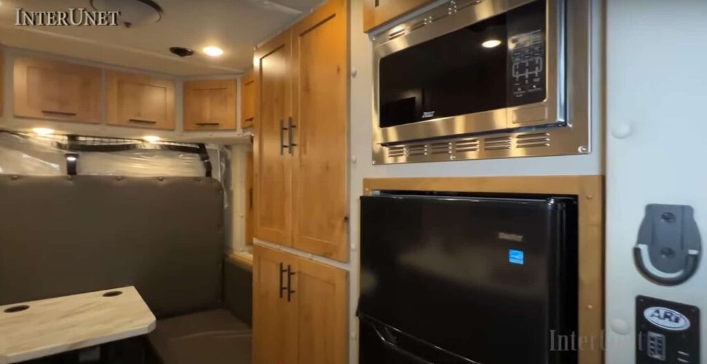 2 bedroom truck kitchen with oven and fridge
