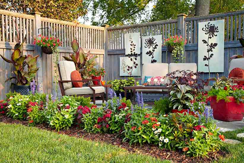 Small backyard patio garden with eating area