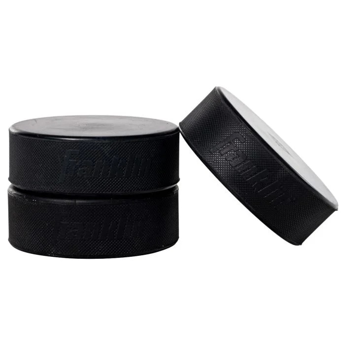 Eleven Hockey Pucks