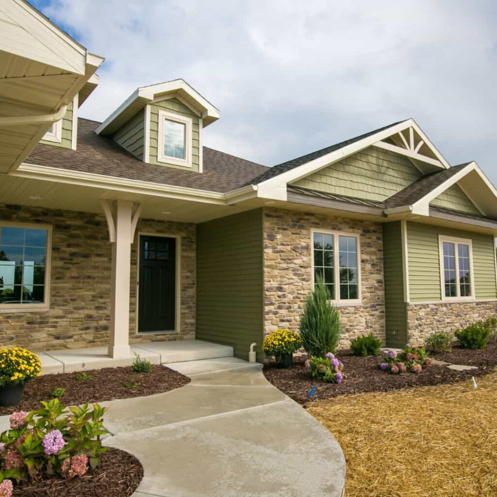 image of Sage green exterior with grey-black roof white window trims