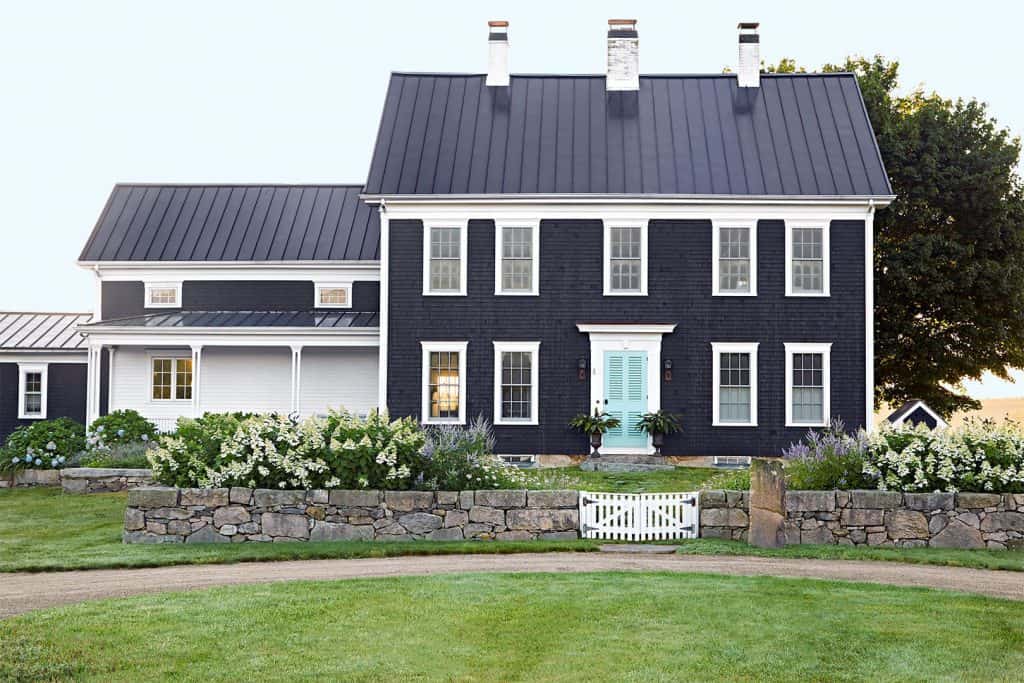 black barndominium with white window