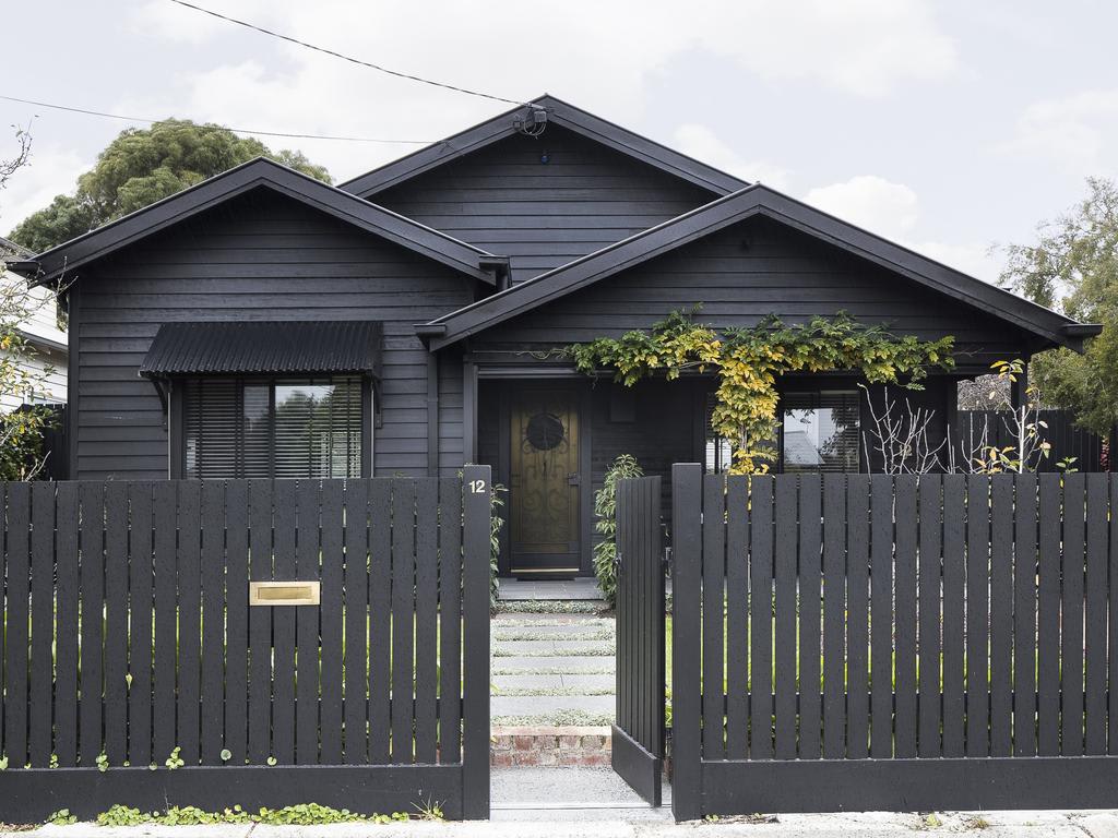 black fence house