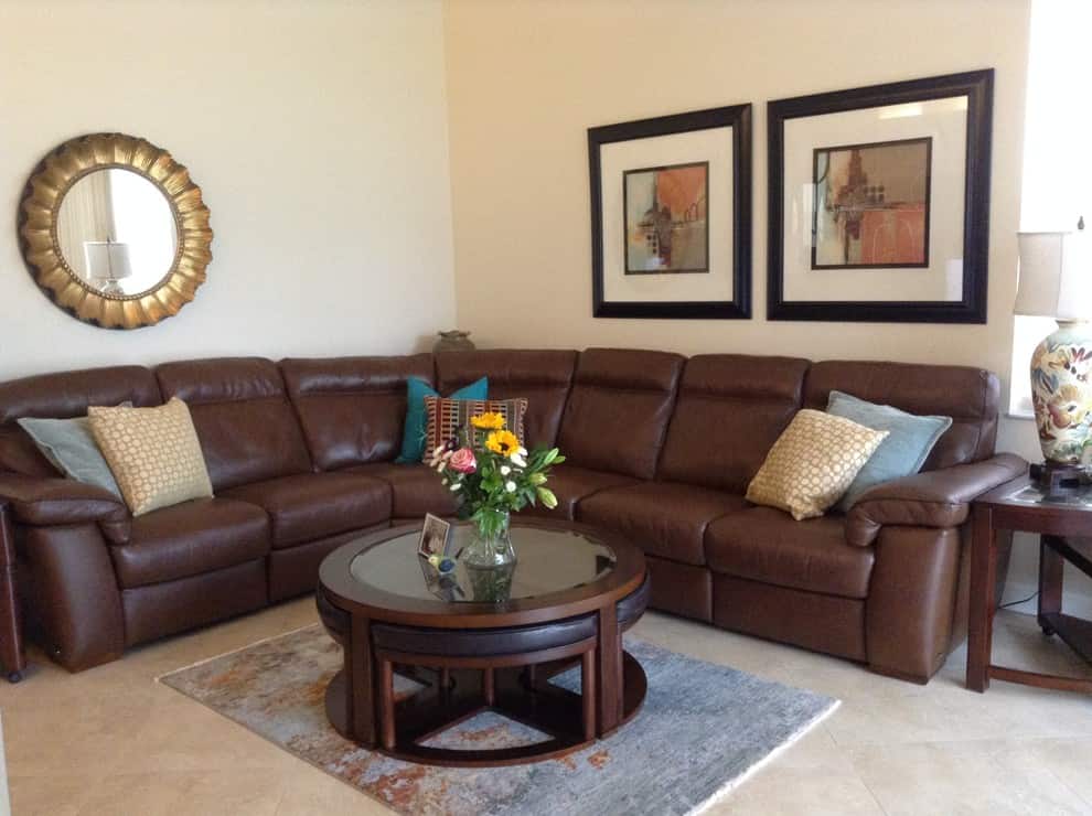 an image with a small 4x6 rug, placed below a small coffee table in a living room