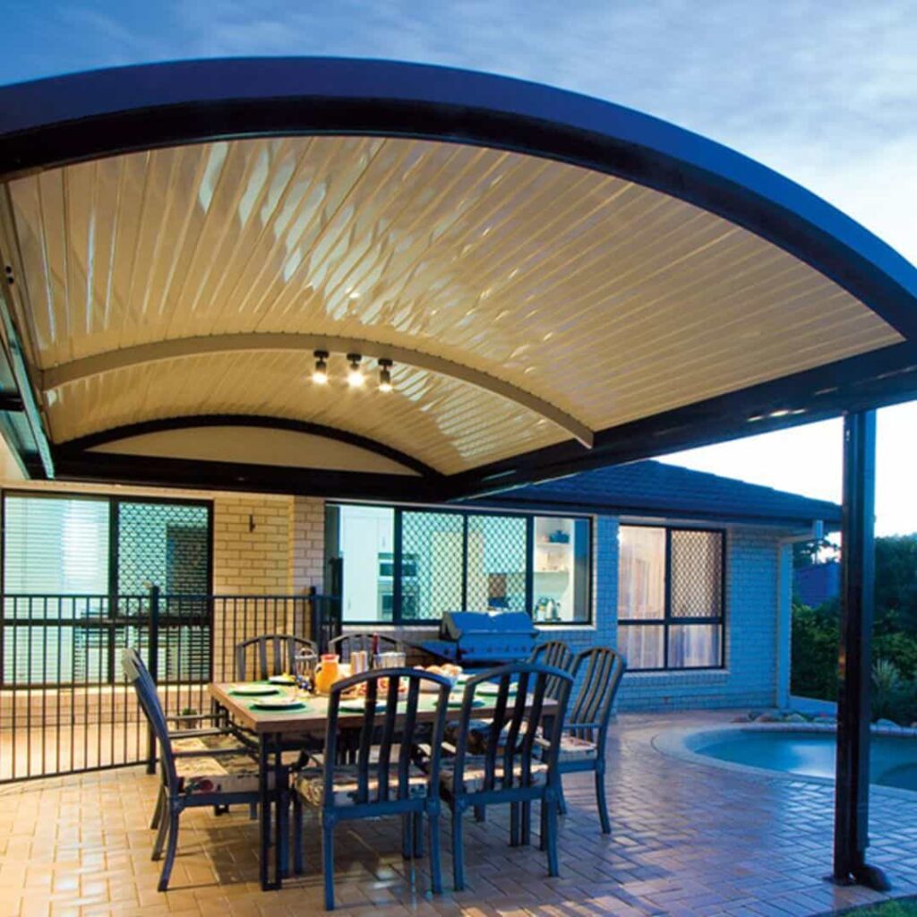 a large curved polycarbonate patio roof extension