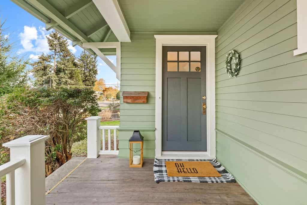 Sage Green house exterior with Gray Front door