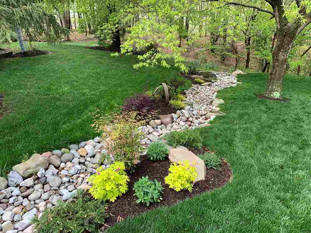 A rock dry creek bed pathway 